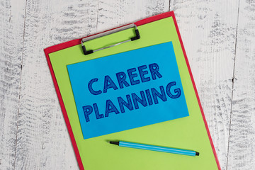 Text sign showing Career Planning. Business photo showcasing Strategically plan your career goals and work success Colored clipboard blank paper sheet marker sticky note wooden background