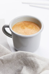 light grey mug with coffe light grey work feminine workspace minimalistic