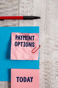 Word writing text Payment Options. Business photo showcasing The way of chosen to compensate the seller of a service Wrinkle paper and cardboard plus stationary placed above wooden background