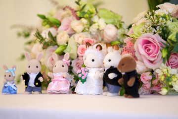 toy figures on wedding cake