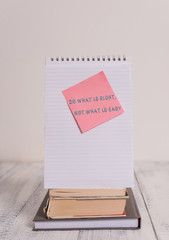 Writing note showing Do What Is Right Not What Is Easy. Business concept for willing to stand up...