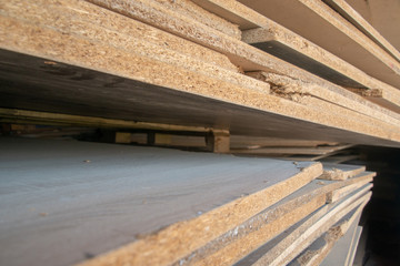 Taking photographs of wood plywood, used for making pellets