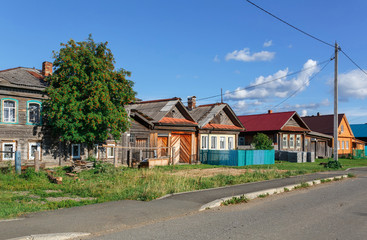 Fototapeta na wymiar Village street in summer. Village of Visim, Sverdlovsk region, Russia.