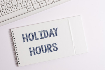 Text sign showing Holiday Hours. Business photo showcasing employee receives twice their normal pay for all hours