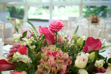 wedding bouquet of pink flowers on table