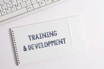 Naklejka premium Text sign showing Training And Development. Business photo showcasing learn specific knowledge to improve perforanalysisce