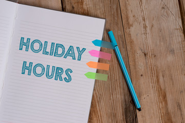 Conceptual hand writing showing Holiday Hours. Concept meaning employee receives twice their normal...