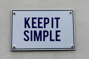 Conceptual hand writing showing Keep It Simple. Concept meaning to make something easy to...