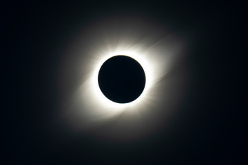 The Solar Corona atmosphere layer during Total Solar Eclipse Chile 2019, amazing view of the Sun covered by the Moon during totality phase while the Moon covers the entire Sun an awesome phenomenom