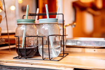 Cocktails, fruits and vegetables in the caravan with a chic big bed. Travel in your home.