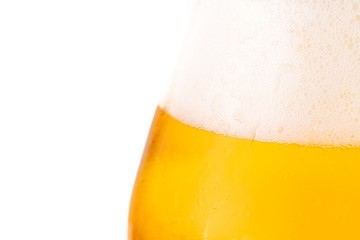 Glass of beer on white background