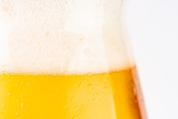 Glass of beer on white background