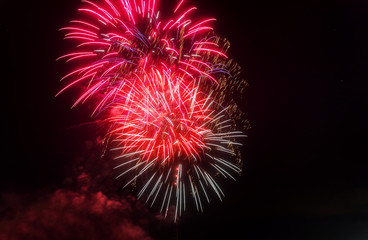 Beautiful colorful holiday fireworks in the evening with majestic long exposure