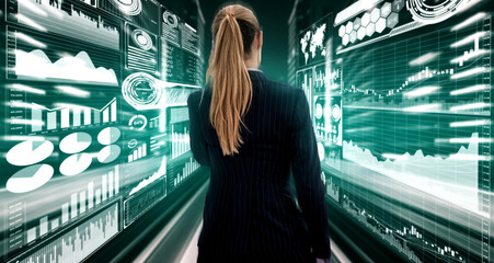 Big Data Technology for Business Finance Analytic Concept. Modern graphic interface shows massive information of business sale report, profit chart and stock market trends analysis on screen monitor.