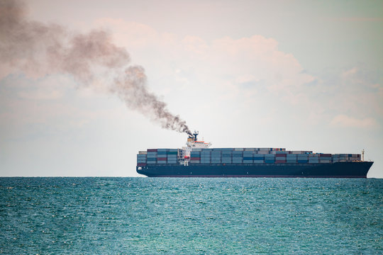 Container ships in the sea have a lot of black smoke.
