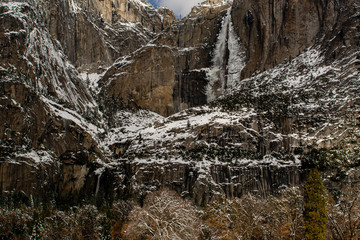 Fototapeta na wymiar Yosemite Falls close-up on a winters day featuring lots of accumulated snow