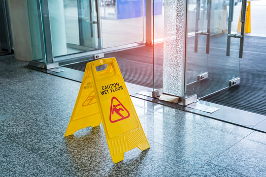 "Caution wet floor" sign interiors