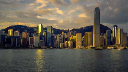 Fototapeta na wymiar morning skyline and sun light on cityscape building in hong kong