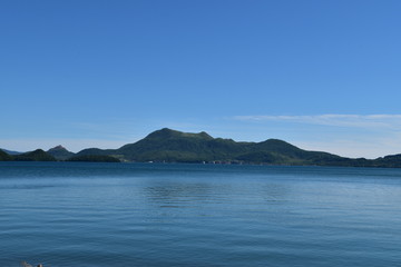 Fototapeta na wymiar Lake Toya with Mount Usu in Hokkaido, Japan