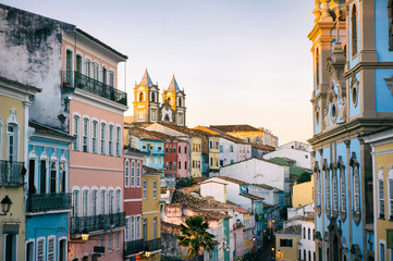Fototapeta na wymiar Scenic dusk view of a historic plaza surrounded by colonial buildings in the tourist district of Pelourinho, in Salvador, Bahia, Brazil