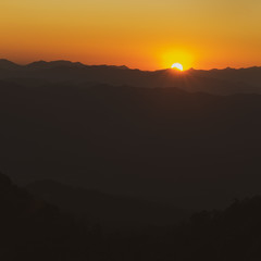 Scenic sunset and mountain view between the hiking route to Doi pui ko, Mae hong son, Thailand.