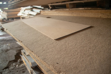 Taking photographs of wood plywood, used for making pellets
