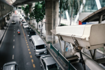 outdoor security CCTV camera in traffic, view from skywalk