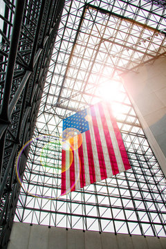 United States Flag Hanging Inside Of A Building