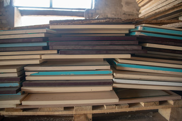 Taking photographs of wood plywood, used for making pellets