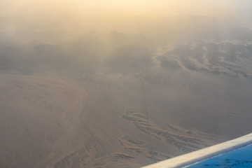 Aerial view on arabian desert and Red sea mountains from the airplane window
