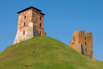 Fototapeta na wymiar Ruins of an ancient medieval castle on a sunny April day. Novogrudok, Belarus