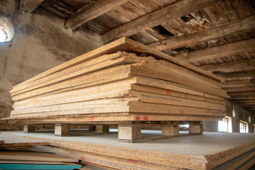 Taking photographs of wood plywood, used for making pellets
