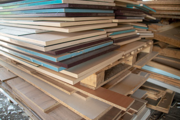 Taking photographs of wood plywood, used for making pellets