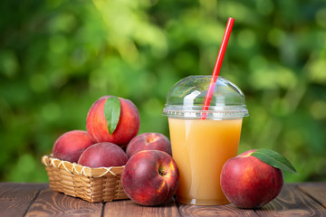 peach juice in plastic cup