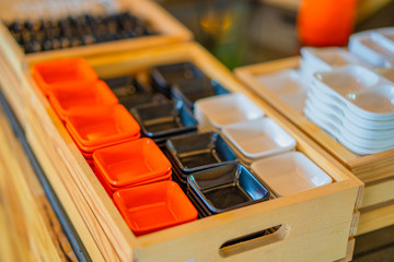 cup of shabu shabu sauce garnish with Chilli Garlic