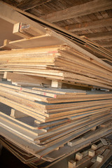 Taking photographs of wood plywood, used for making pellets
