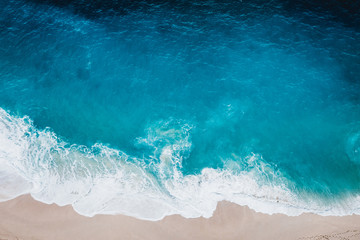 Wild beach, top view, waves