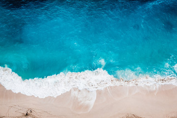 Wild beach, top view, waves