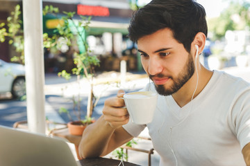 Young man taking a coffee break