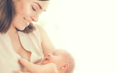 Mother and her newborn baby. Happy family. Maternity concept. Parenthood
