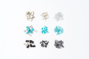 Various kinds of paper clips and drawing pins