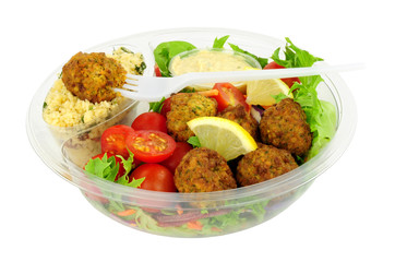 Falafel and couscous salad bowl convenience meal isolated on a white background