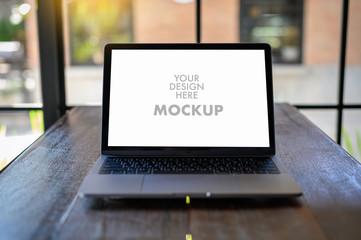 Mockup of business man using laptop screen for your advertising text message Laptop with blank...