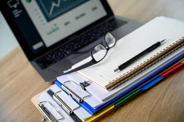 Businessman working reading documents graph financial to job succes Analyze document plans.