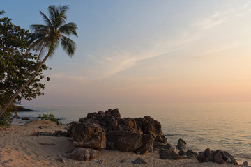 Fototapeta na wymiar Sunset at Rocky Beach on Koh Lanta, Thailand