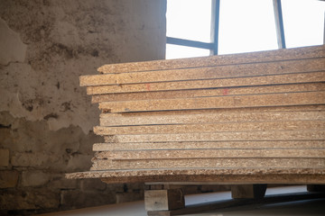 Taking photographs of wood plywood, used for making pellets