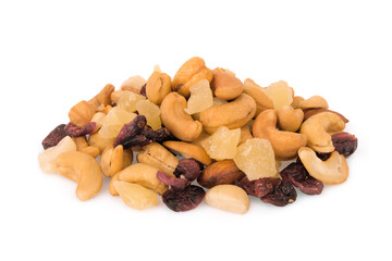 pile of mixed nuts and dried fruits isolated on white background, food for health