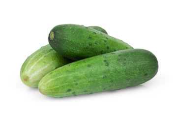 three whole cucumbers isolated on white background
