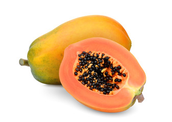 whole and half of ripe papaya fruit with seeds isolated on white background