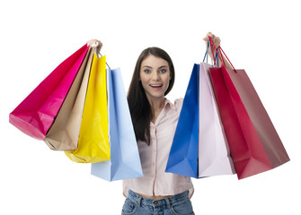 Happy woman with shopping bags in hand. Isolated on white background.